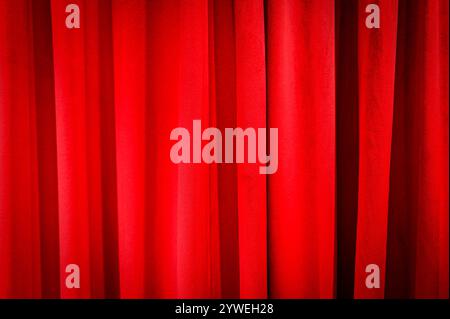 Closed red curtains as background or texture Stock Photo