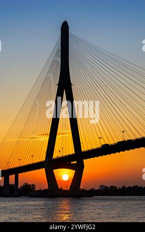 Tower of the Can Tho Bridge at the sunset in the city of Can Tho, Vietnam Stock Photo