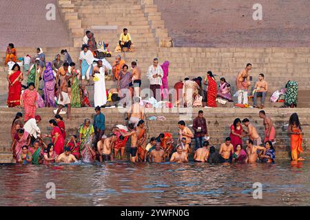 People bathing in the River Ganges in Varanasi, India Stock Photo