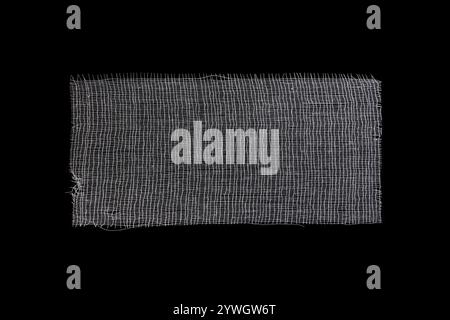 Cotton thread bandage rectangle on black background, close up photography Stock Photo