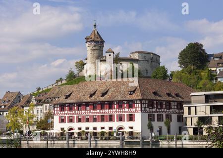 Historic castle with towers and half-timbered house under a blue sky, Munot fortress, Old Town Schaffhausen, Schaffhausen, Canton Schaffhausen, Switze Stock Photo