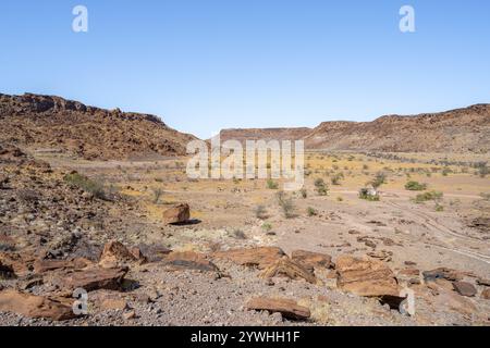 Barren landscape with boulders in a valley, desert landscape, Twyfelfontein, Kunene, Namibia, Africa Stock Photo