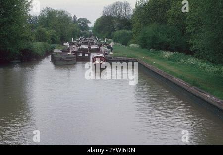 A cold gray day at Stockton Locks.   The Stockton flight of 10 locks is on the Grand Union Canal near the historic village of Stockton in Warwickshire.  From the locks, there are stunning views of the surrounding countryside. Stockton Top Marina and The Boat Inn are at the top of the flight and the Blue Lias pub is at the bottom. The Grand Union Canal links London and Birmingham and was completed in the early 19th century.  Stockton Locks are between Napton Junction and the village of Long Itchington. Stock Photo