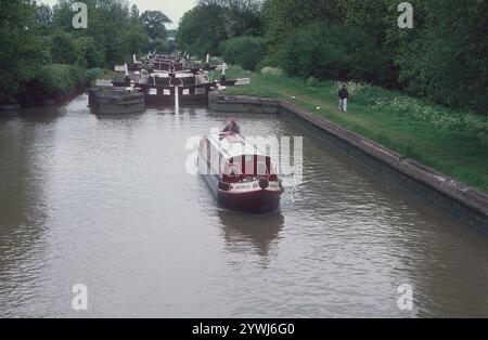 A cold gray day at Stockton Locks.   The Stockton flight of 10 locks is on the Grand Union Canal near the historic village of Stockton in Warwickshire.  From the locks, there are stunning views of the surrounding countryside. Stockton Top Marina and The Boat Inn are at the top of the flight and the Blue Lias pub is at the bottom. The Grand Union Canal links London and Birmingham and was completed in the early 19th century.  Stockton Locks are between Napton Junction and the village of Long Itchington. Stock Photo