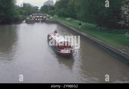 A cold gray day at Stockton Locks.   The Stockton flight of 10 locks is on the Grand Union Canal near the historic village of Stockton in Warwickshire.  From the locks, there are stunning views of the surrounding countryside. Stockton Top Marina and The Boat Inn are at the top of the flight and the Blue Lias pub is at the bottom. The Grand Union Canal links London and Birmingham and was completed in the early 19th century.  Stockton Locks are between Napton Junction and the village of Long Itchington. Stock Photo