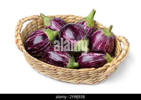 Fresh raw purple striped mini eggplants in a basket isolated on white background close up Stock Photo