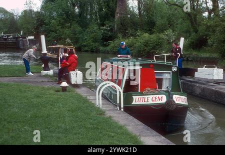 A cold gray day in May at Stockton Locks.   The Stockton flight of 10 locks is on the Grand Union Canal near the historic village of Stockton in Warwickshire.  From the locks, there are stunning views of the surrounding countryside. Stockton Top Marina and The Boat Inn are at the top of the flight and the Blue Lias pub is at the bottom. The Grand Union Canal links London and Birmingham and was completed in the early 19th century.  Stockton Locks are between Napton Junction and the village of Long Itchington. Stock Photo