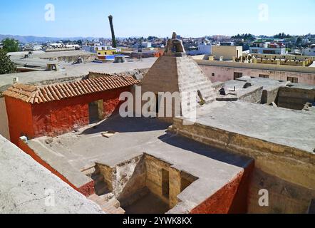 Part of historical buildings in the Convent of Santa Catalina de Siena with the cityscape of Arequipa, Peru, South America Stock Photo