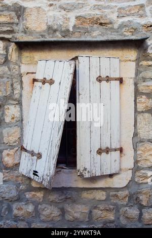 Broken old window in Budva, Montenegro Stock Photo