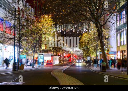 View of Oxford street with tradiotnal Christmas lights and decorations at night Stock Photo