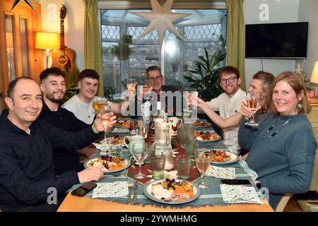 Family Christmas dinner at home UK Stock Photo