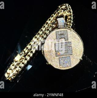 New York, New York, USA. 10th Dec, 2024. Nipsey Hussle All Money In A$M, Mike Do of Seoul Jewelry, necklace, seen on display at the Ice Cold: An Exhibition of Hip Hop Jewelry held at the American Museum of Natural History. (Credit Image: © Nancy Kaszerman/ZUMA Press Wire) EDITORIAL USAGE ONLY! Not for Commercial USAGE! Stock Photo