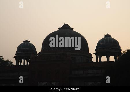 Silhouette of the domes on Isa Khan's Mosque, Tomb of Isa Khan, Humayun's Tomb complex, New Delhi, India Stock Photo