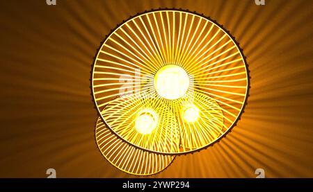 Ceiling light casting shadows on to the ceiling Stock Photo