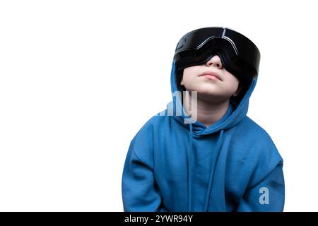 Portrait of girl with virtual reality headset in blue hoodie isolated on white background. Virtual reality glasses. Cyberspace, entertainment Stock Photo
