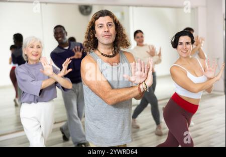 Group of people practicing energetic lindy hop movements Stock Photo