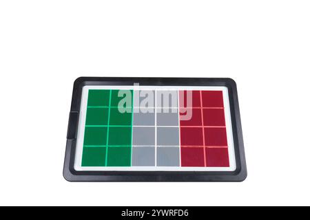 Portable solar panel in the shape of the flag of Italy isolated on white background (close-up). Concept for the development of renewable green energy Stock Photo