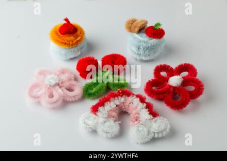 handmade rose flower craft set hair clip or pipe cleaner scarf, mini flower bouquet isolated on white background Stock Photo