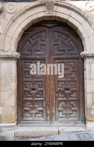 Historic,ancient wooden doors in the old Spanish city of Cuenca, Spain, Europe. Stock Photo