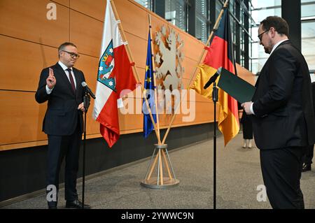 Erfurt, Germany. 12th Dec, 2024. CDU politician Voigt at his swearing-in ceremony as the new Minister President of Thuringia. Voigt has been elected as the new Minister President and leads Germany's first blackberry coalition. Credit: Martin Schutt/dpa/Alamy Live News Stock Photo