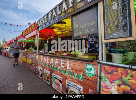 London - 17 06 2022: Street food stalls on Acklam Rd near Portobello Road Stock Photo