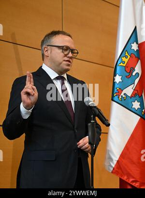 Erfurt, Germany. 12th Dec, 2024. Mario Voigt being sworn in as the new Minister President of Thuringia. CDU politician Voigt has been elected as the new Minister President and leads Germany's first blackberry coalition. Credit: Bodo Schackow/dpa/Alamy Live News Stock Photo