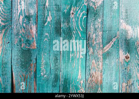 Close-Up of Aged Turquoise Wooden Planks with Peeling Paint and Natural Wood Grain Stock Photo