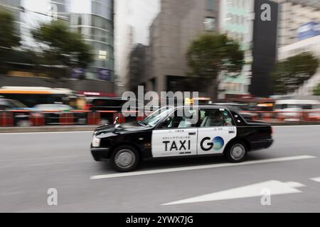 Taxi in the streets of Ginza area,Chuo City,Tokyo,Japan, Asia. Stock Photo