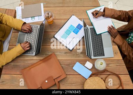 Top View of Professionals Collaborating on Business Project Stock Photo