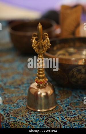 a bronze buddhist hand bell isolated over a white background Stock Photo