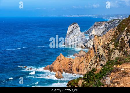 Scenic coastline of the Atlantic Ocean in Portugal, north of Cape Roca, Sintra region. Stock Photo