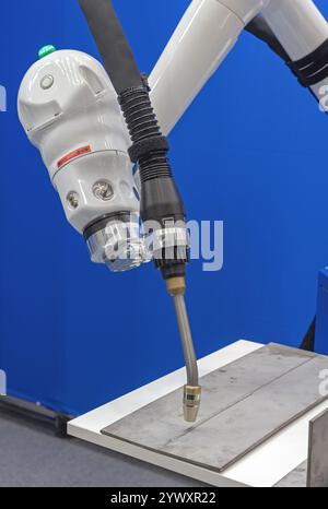 Automated Robot Arm Welding Metal Fabrication Equipment Factory Production Stock Photo