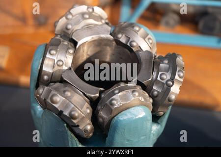 Drill bits. Perforator button for water wells. Tricone bit. Equipment for water and coal wells. Drilling heads Stock Photo