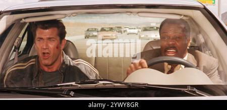 LETHAL WEAPON 4 1998 Warner Bros. film with Mel Gibson at left and Danny Glover Stock Photo