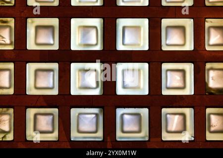 A geometric arrangement of illuminated glass bricks Stock Photo