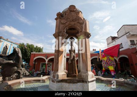 Jiquilpan, Michoacán, Mexico- December 24, 2023: Water bubbles out of the historic Aquadora Fountain in the central district. Stock Photo