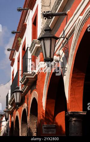 Jiquilpan, Michoacán, Mexico- December 24, 2023: Afternoon light shines on the colonial streets and buildings of central Jiquilpan. Stock Photo