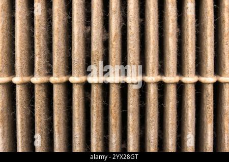 Close up of dusty air filter material of car , car air filter clogged , Car maintenance concept Stock Photo