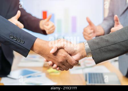 Businesswoman handshake and business people. Successful business handshake concept. Selective focus. Stock Photo