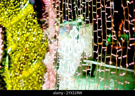 glowing colorful Christmas lights on black background, overlay Stock Photo