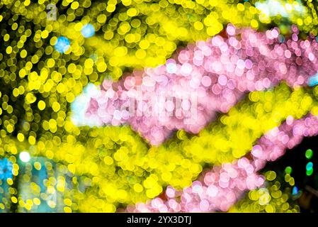 glowing colorful Christmas lights on black background, overlay Stock Photo
