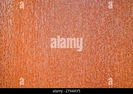 Rusted smooth metal surface. Rust red background. Stock Photo
