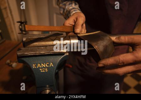 Metal instrument maker dovetails a rim blank for a trombone, Magdeburg, Saxony-Anhalt, Germany, Europe Stock Photo