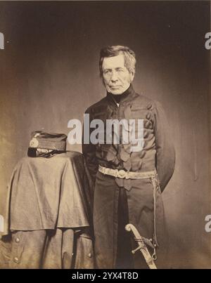 Lt. General Sir J. Burgoyne, G.C.B., 1855.  Additional Info: Portrait of a standing man in military attire with his hands behind his back and hat on a stand at his side. Stock Photo