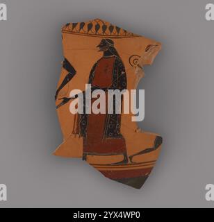 Attic Black-Figure Neck Amphora Fragment, about 530 BC. Man Carrying a Wreath.  Additional Info: On the shoulder: frieze of open lotuses. On the body: i) arm of figure facing left, (ii) bearded male to left with long hair, wearing a wreath, in a red robe and patterned mantle. He holds a circular object (ring? wreath?) in his left hand. There is a tendril at the location of the missing handle. Under the handle is a figure moving right. Stock Photo