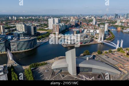 Salford Quays, Greater Manchester, England. Aerial view across MediaCityUK, The Lowry and the modern waterfront beside Manchester Ship Canal. Stock Photo