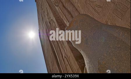 Statue of Horus in front of The Horus Temple in Edfu, Egypt Stock Photo