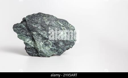 Green stone with mica on white background Stock Photo