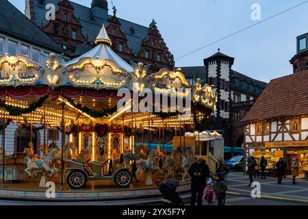 Children's rides are a popular attraction at the Frankfurt Christmas Market (Weihnachtsmarkt). Frankfurt has one of the oldest and largest Christmas markets in the world. Stock Photo