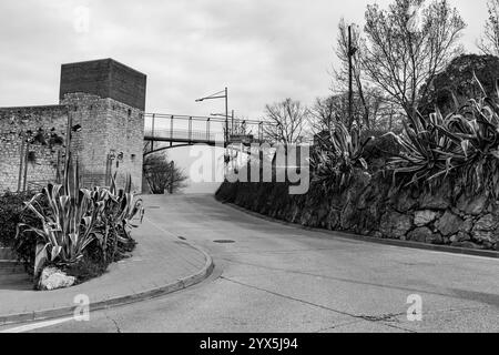 Girona, Catalonia, Spain - FEB 12, 2022: Ancient city walls of Girona, one of the most complete city walls in Europe. Stock Photo